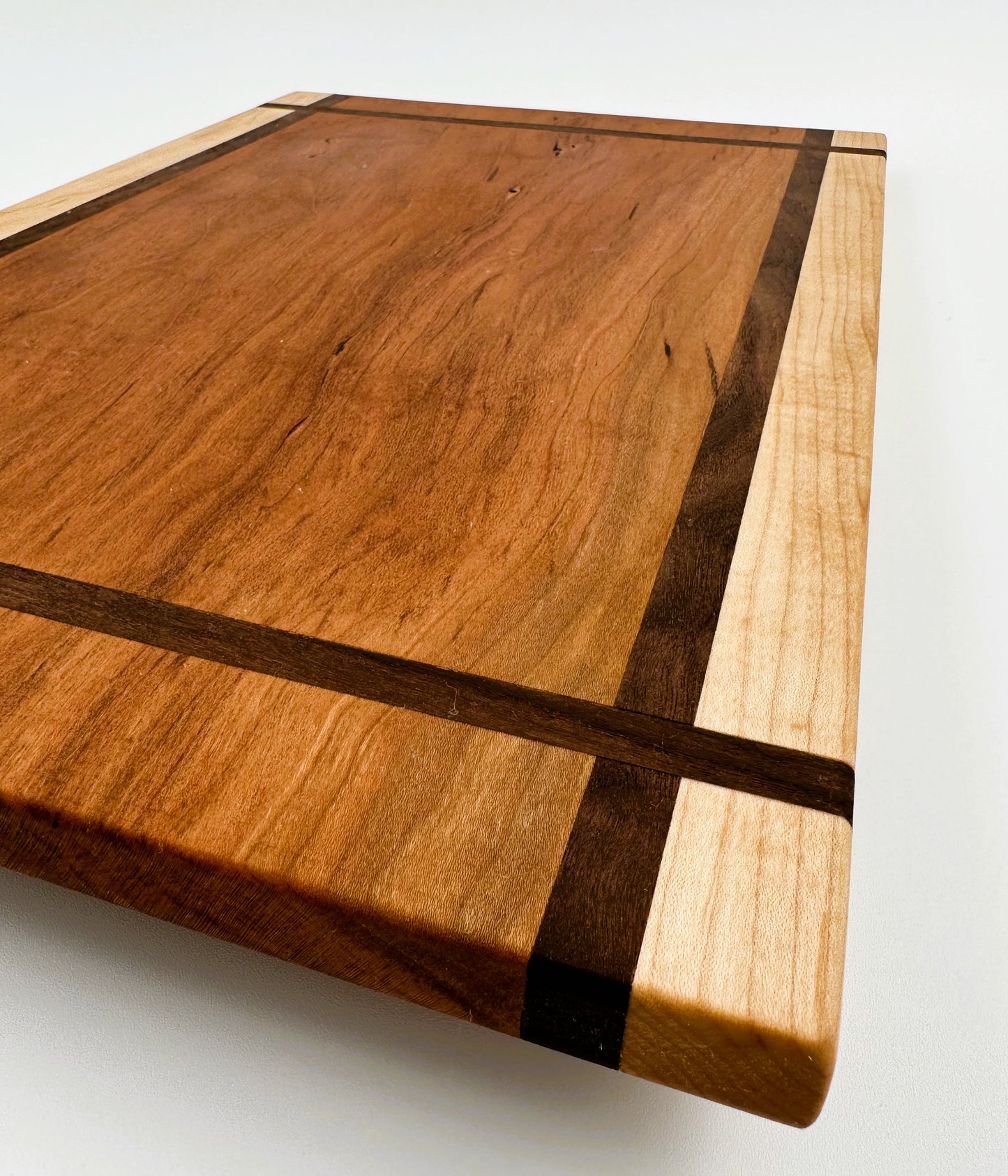 Cherry Wood Cutting Board with Maple Trim and Walnut Inlay